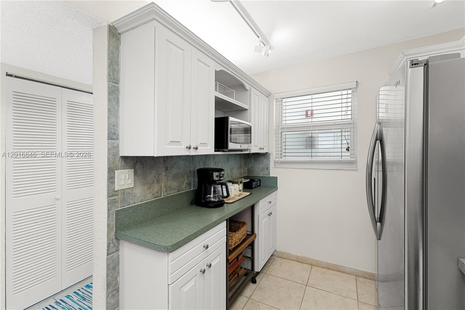 DELPHI TOWERS CONDO · #409 in Pompano Beach - Photo 2