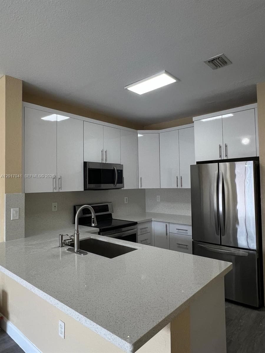 SHOMA HOMES AT COUNTRY CL · #203-13 in Hialeah - Photo 4