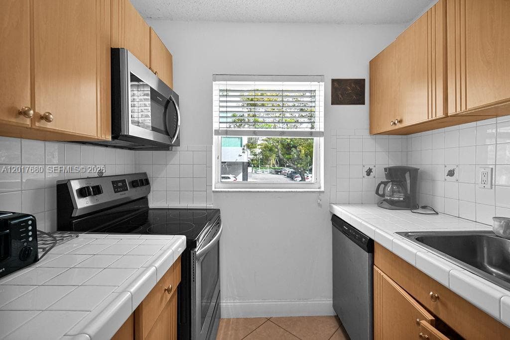 GROVES EDGE CONDO · #207 in Miami - Photo 11