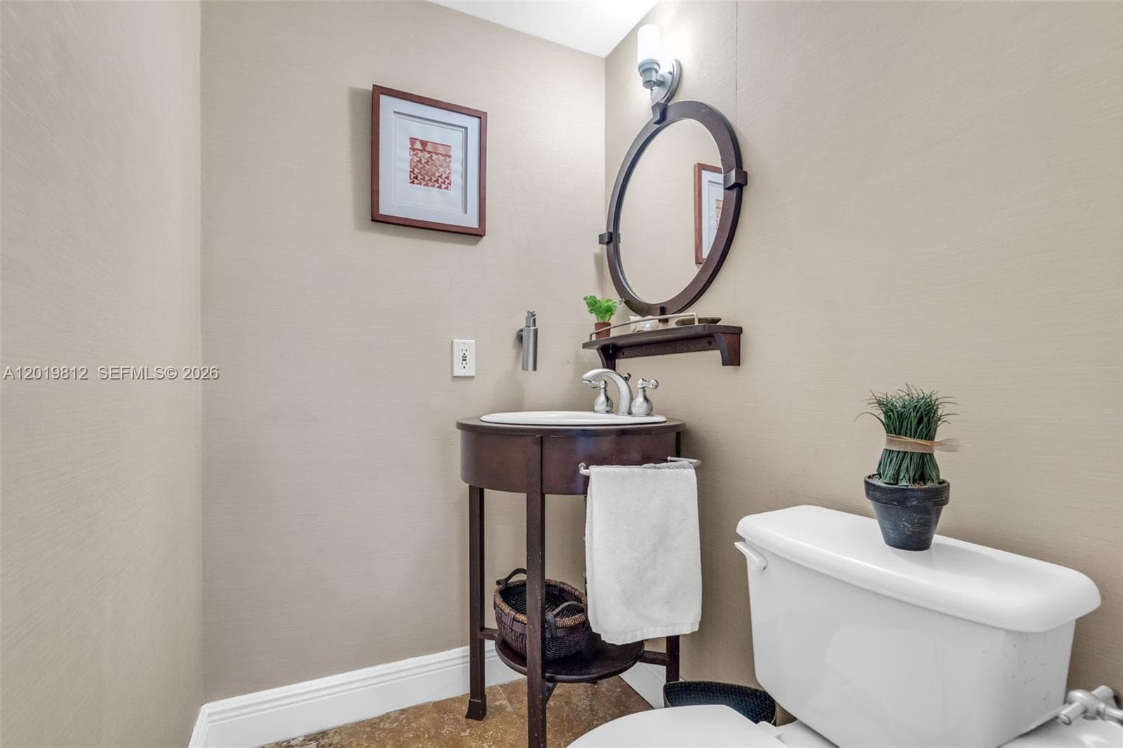 Powder bathroom same level as kitchen, dining room and family room