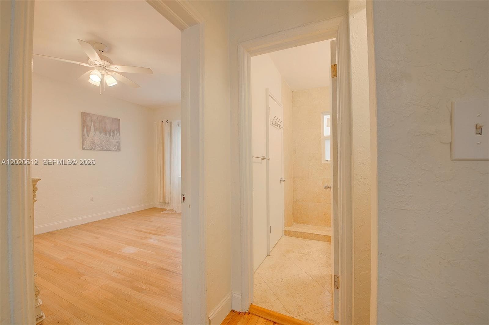 bathroom entrance from bedroom and living  area