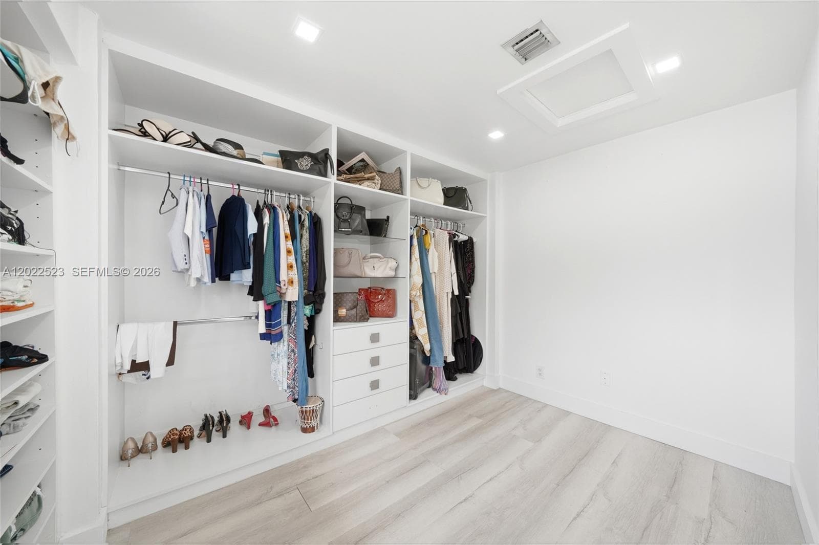 Primary Suite Walk-In Closet