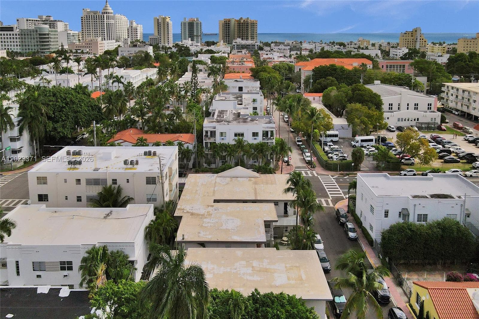 Espanola Way Shops and Atlantic Ocean in the background.  717 Espanola is the tan roof building