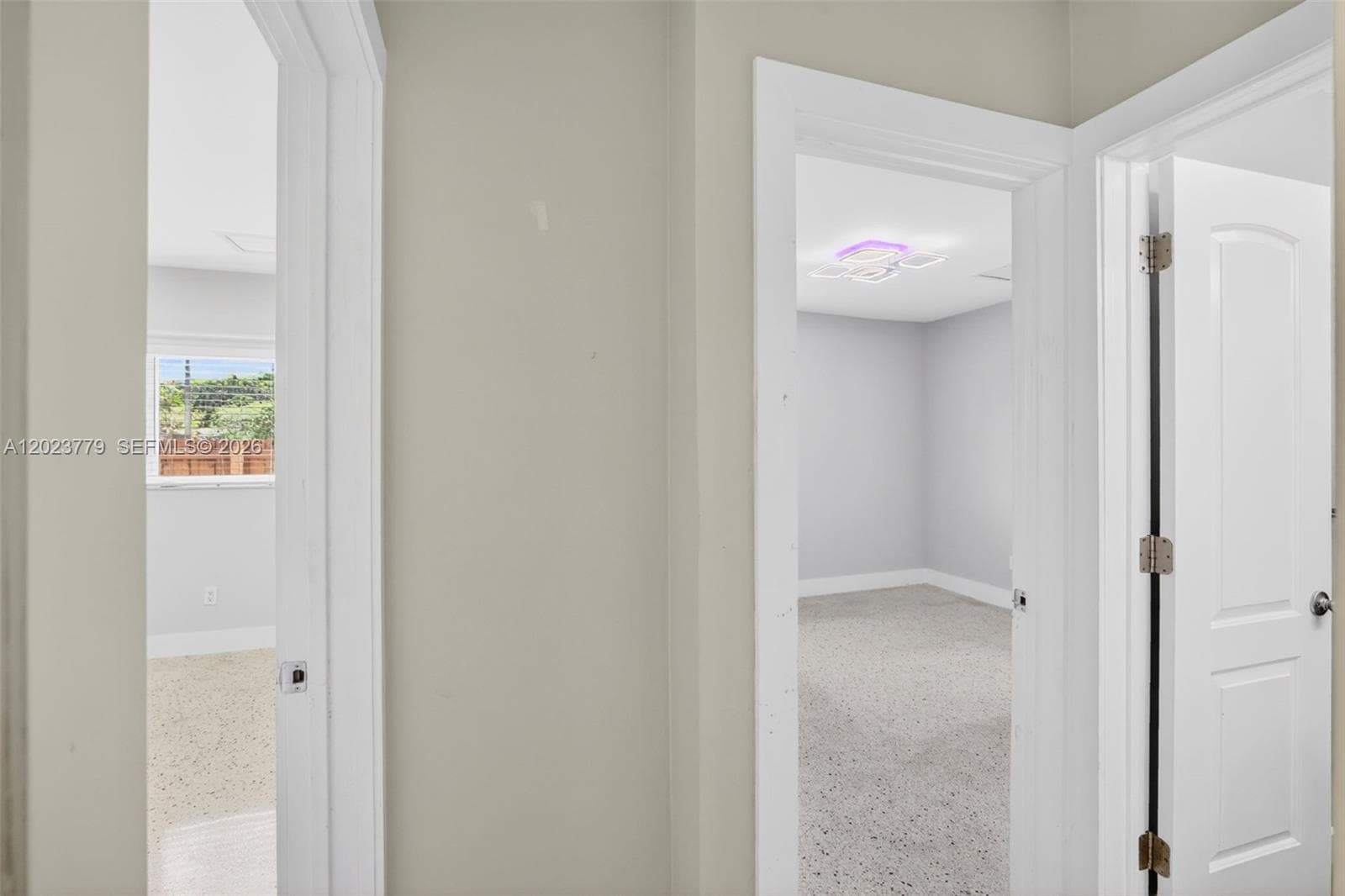 View toward two guest bedrooms and guest bathroom
