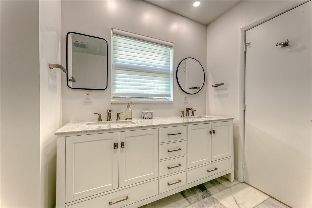 main bathroom with double sink