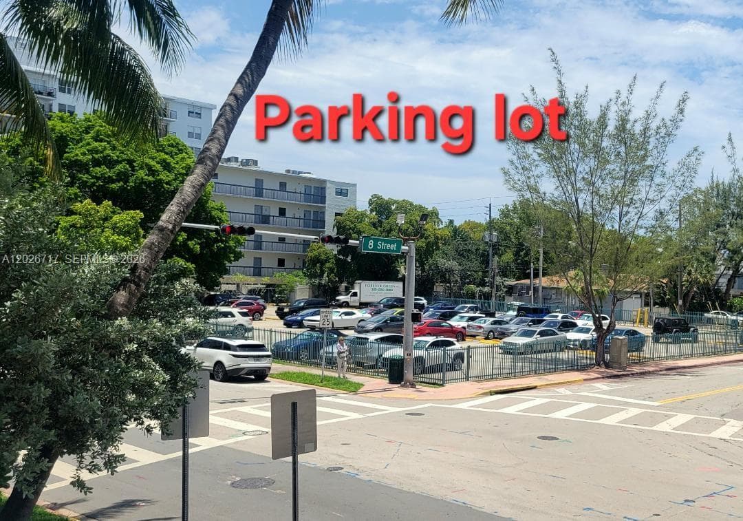 Parking lot is across the street from the bldg.