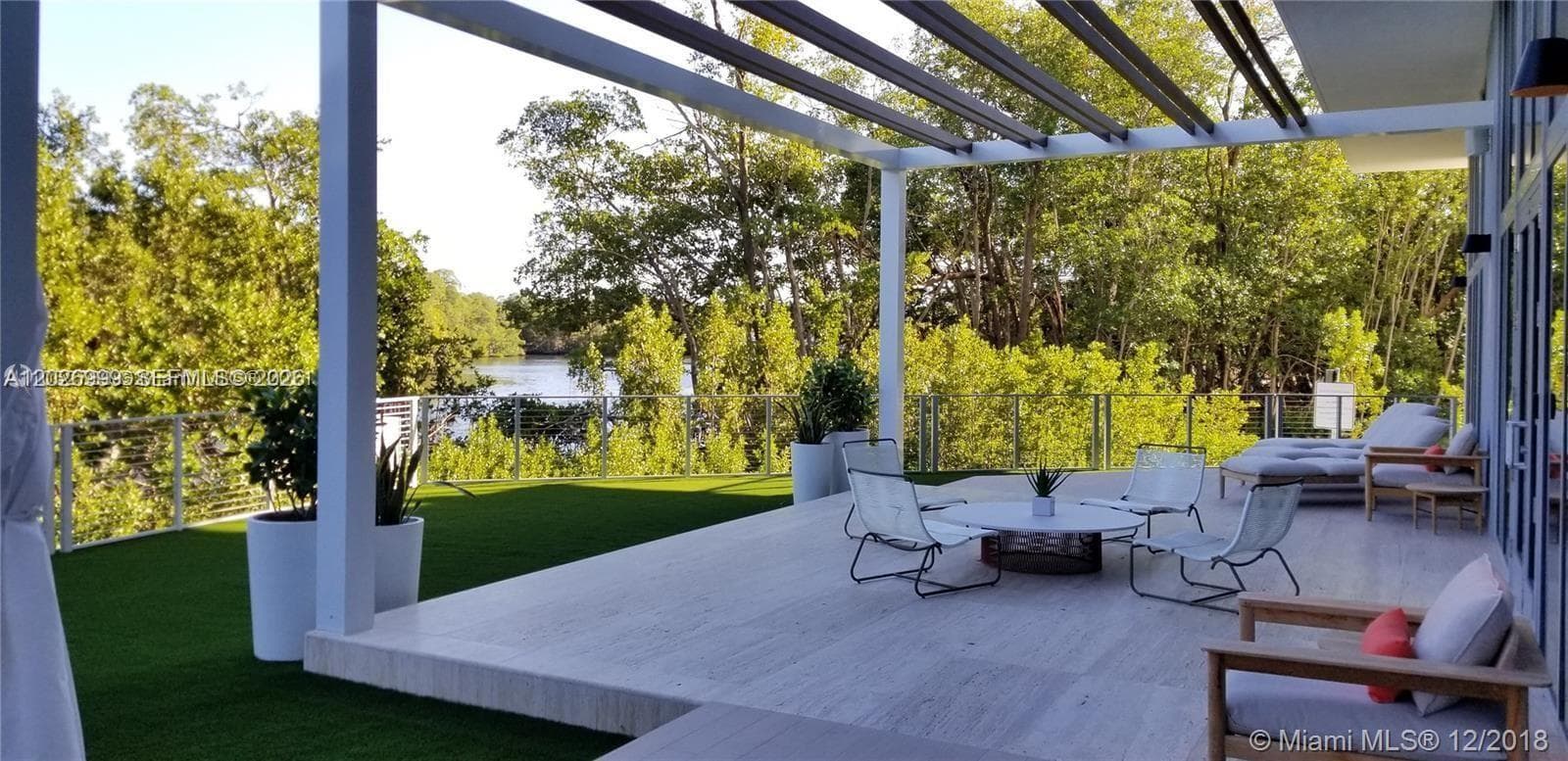 Light-filled studio with mirrored walls, mats, and balance gear—perfect for yoga, stretching, or personal training sessions.