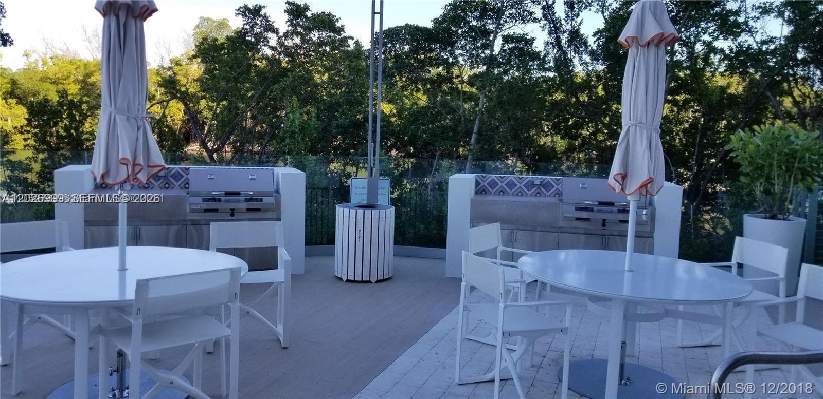 Elegant spa area with wood-paneled saunas and lounge seating for post-workout recovery or unwinding.
