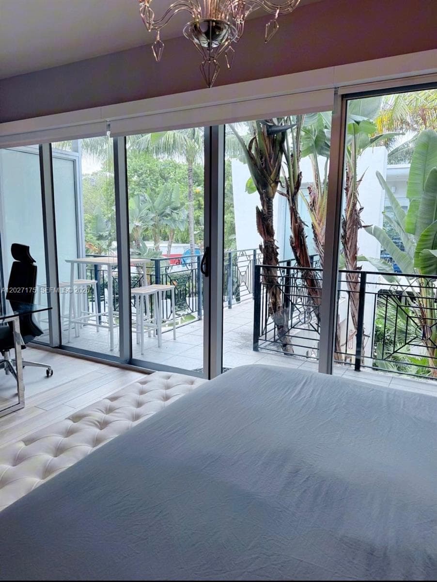 Master bedroom over looking the balcony