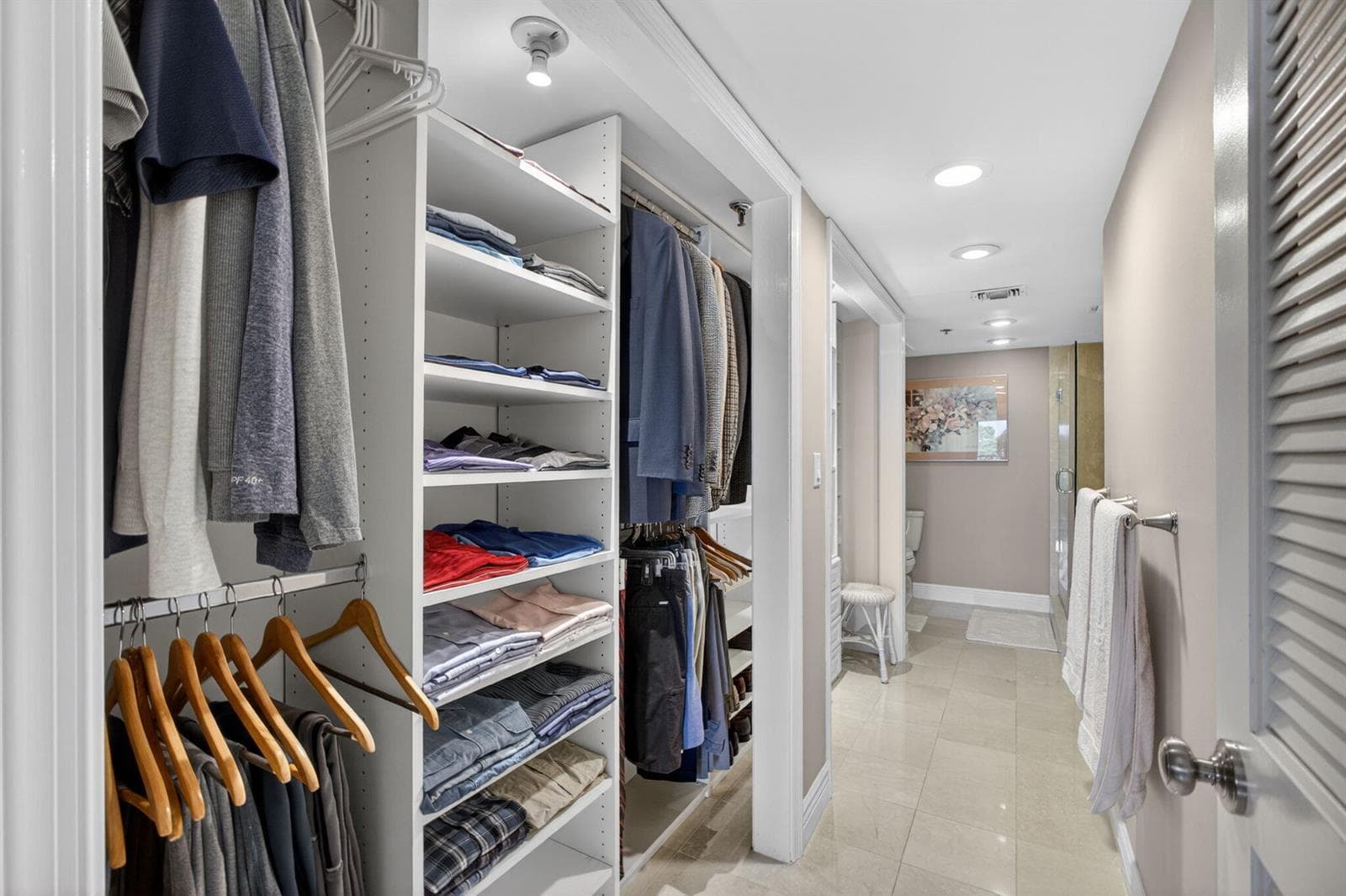 Primary Closet into Bathroom