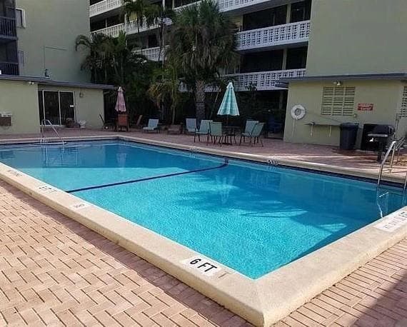 Recreation room + bbq area .