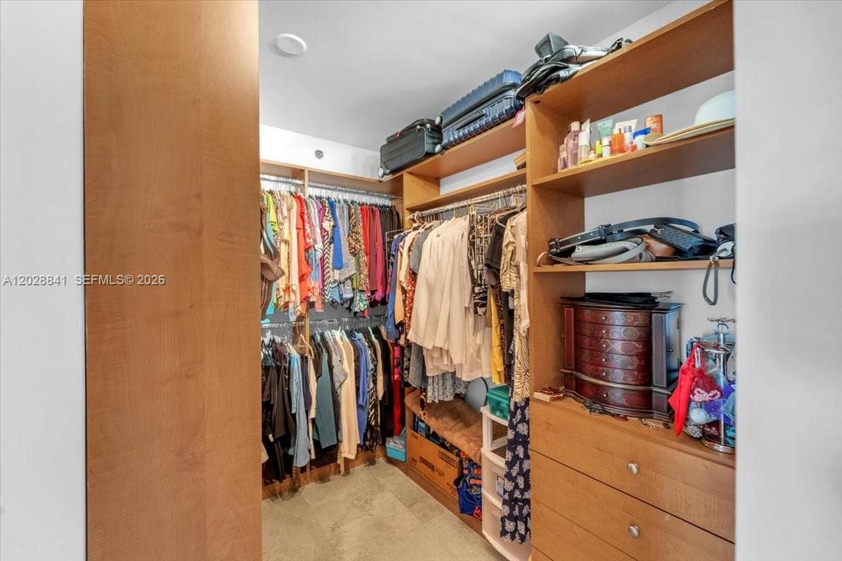 Transformed the primary bedroom by adding an expansive walk-in closet, complemented by two additional hall closets for enhanced storage and organization.