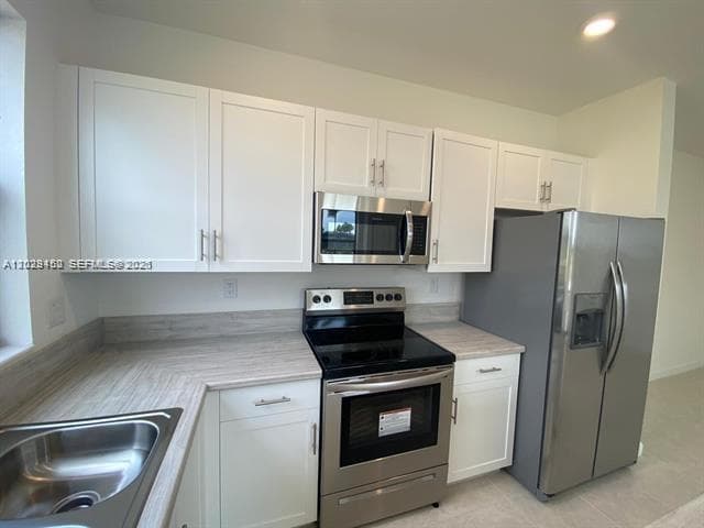 593 NE 208th Ter photo 18