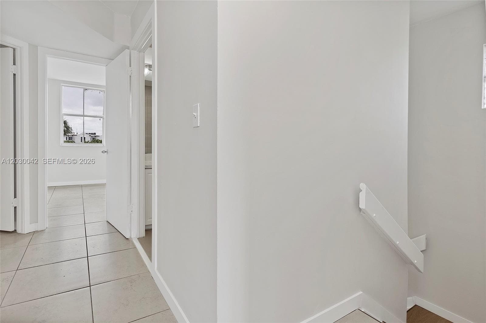 hall way to all three bedrooms