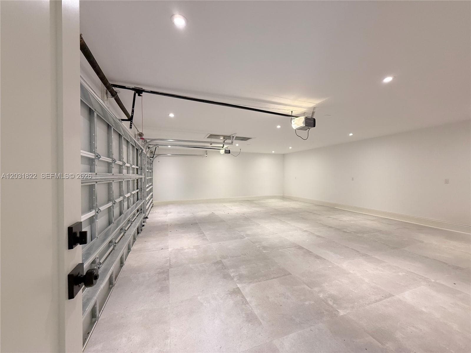 3 CAR GARAGE WITH TILE