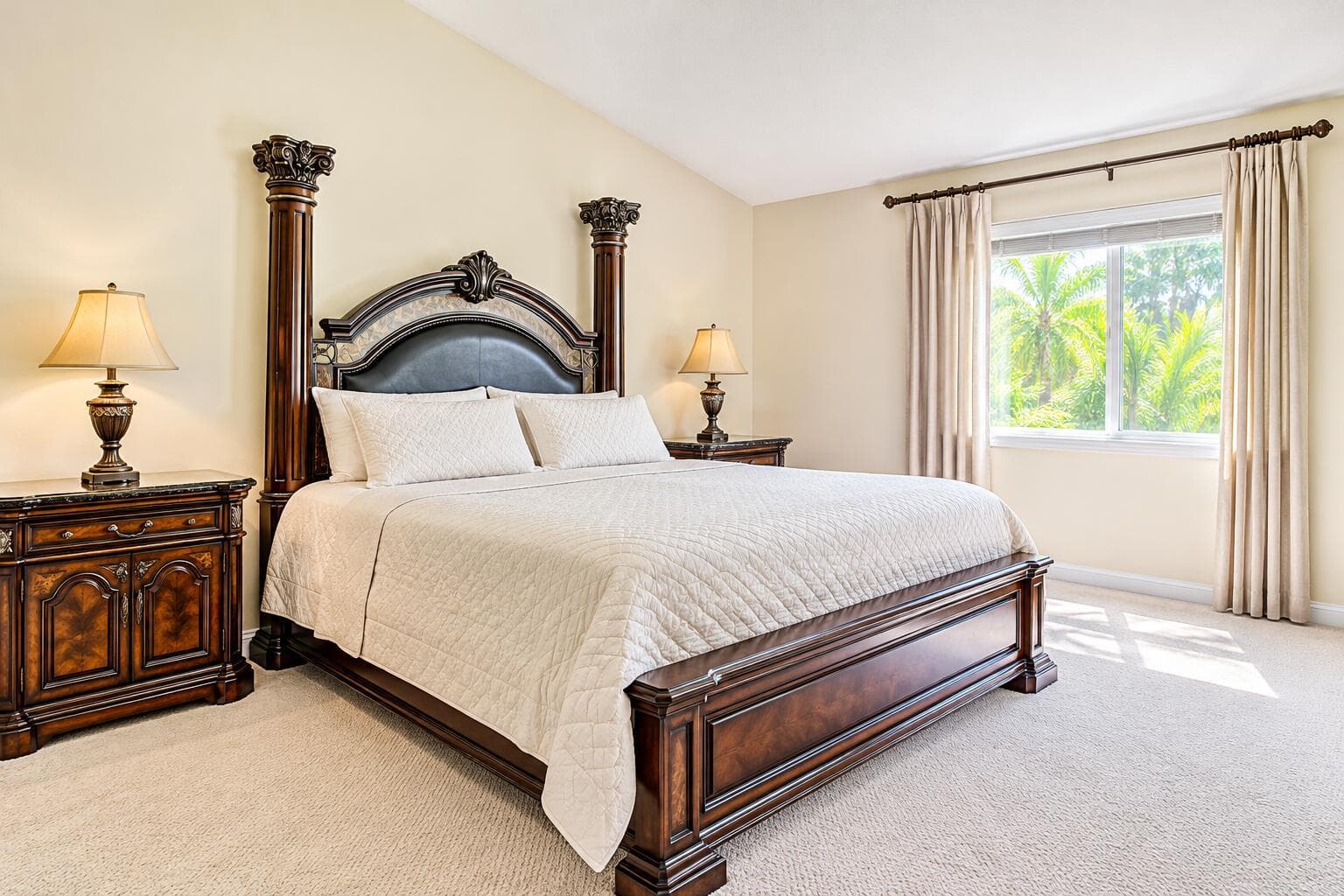 Classic Bedroom with Ornate Wood Furnitu
