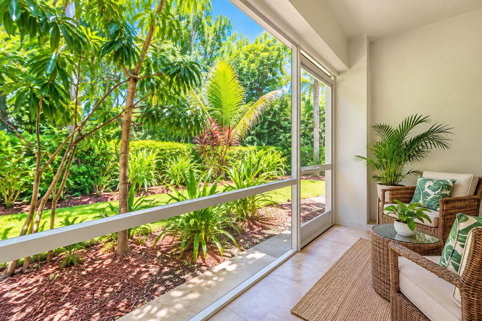 Sunlit Lanai Overlooking Tropical Garden