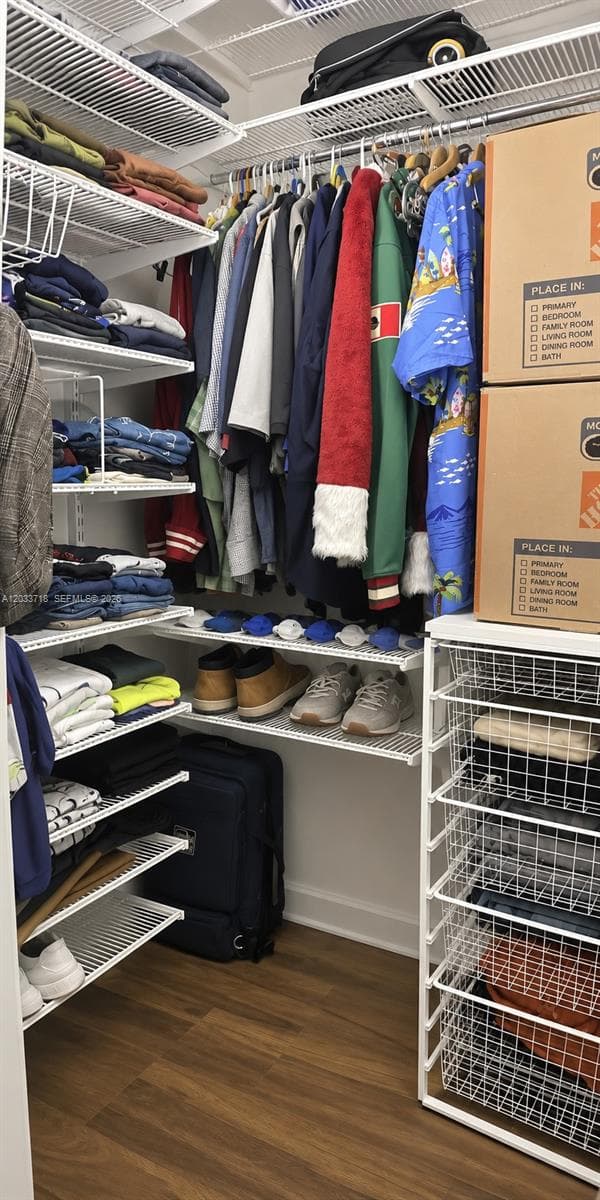2 of 2 Walk-In Closets in Main Bedroom