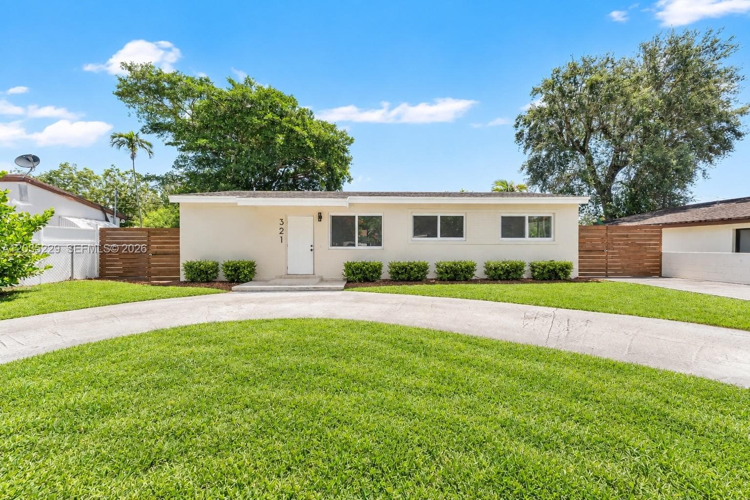 Massive circular driveway. AI-edited photograph for marketing purposes.