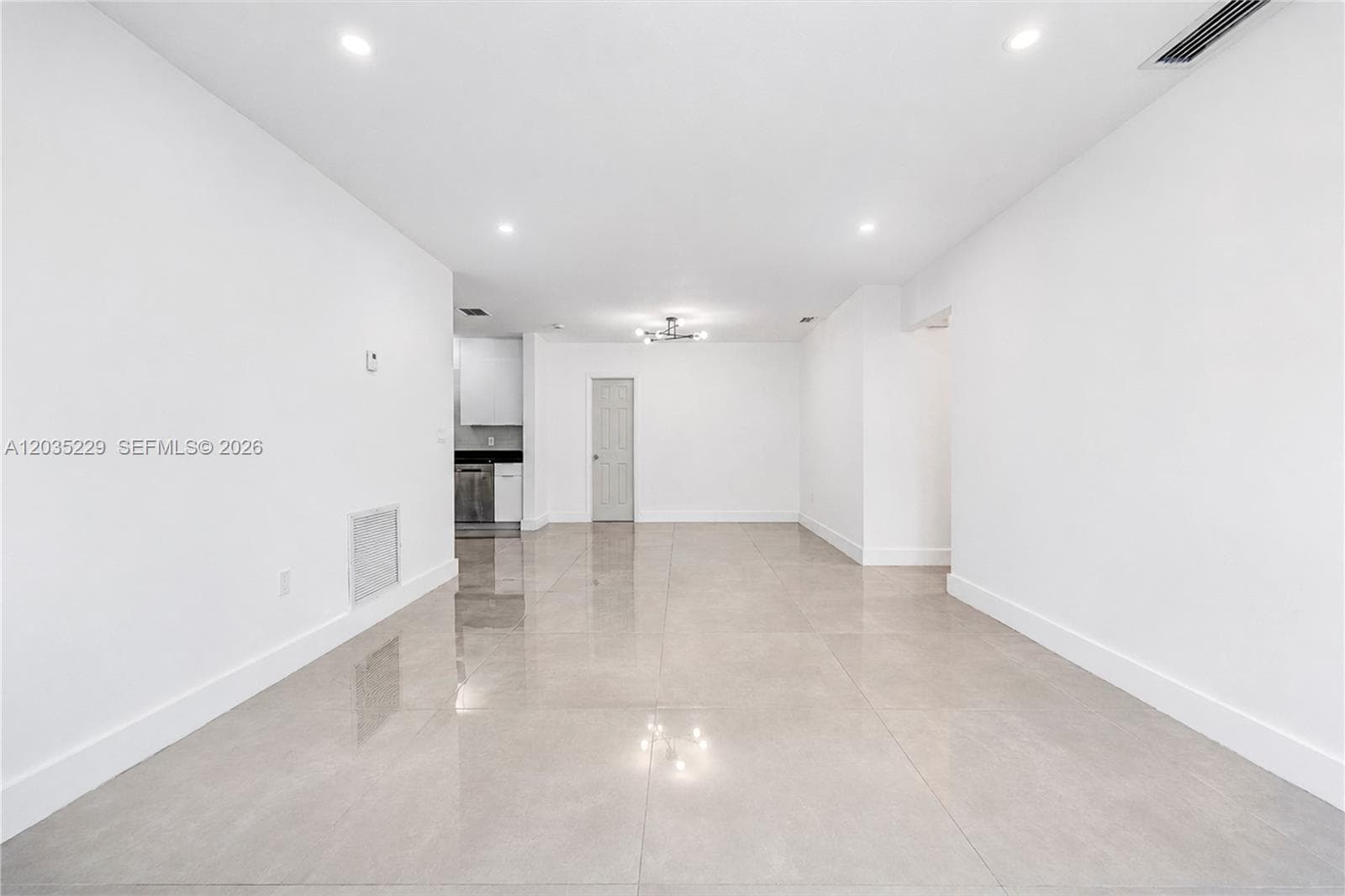 Bright open-concept living and dining area.