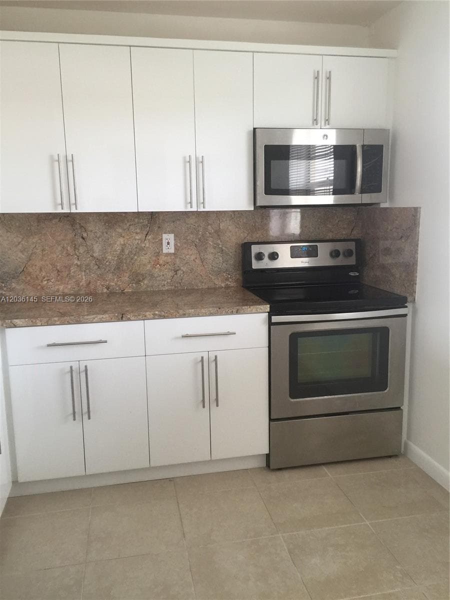VILLAGE OF KINGS CREEK CO · #E-415 in Miami - Photo 3