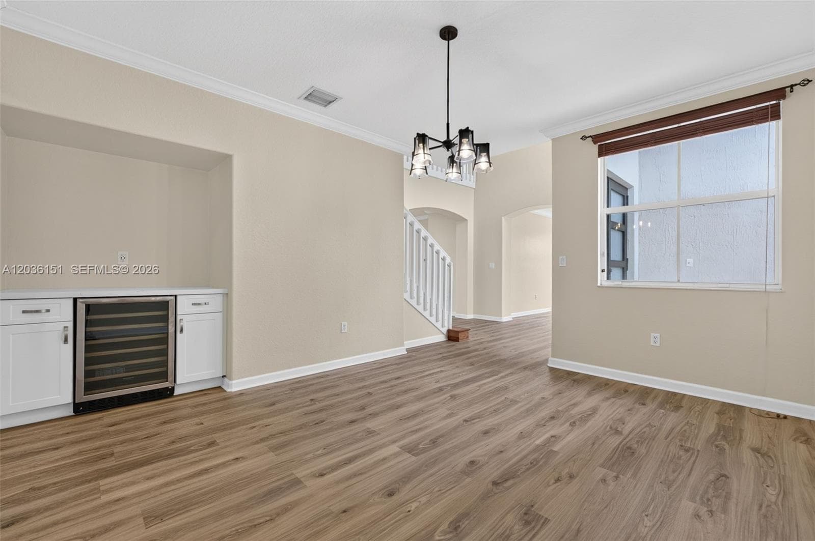 Formal dining, custom cabinet that includes a wine cooler