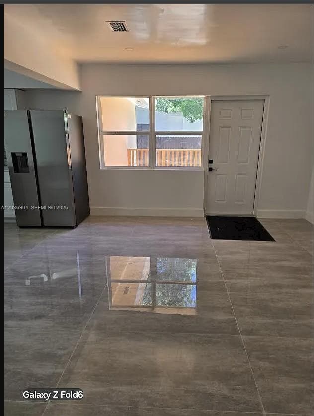 FAMILY ROOM WITH EXIT TO DECK