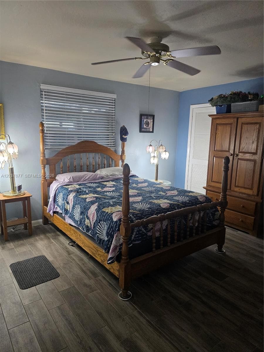 Roomy Primary bedroom with French doors to bring in the light.