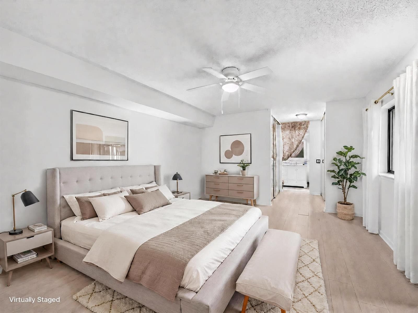 Virtually staged primary bedroom