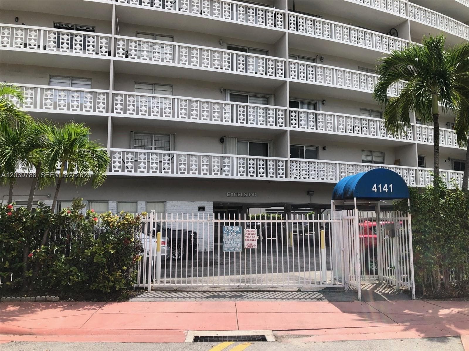 Exterior front of gated building