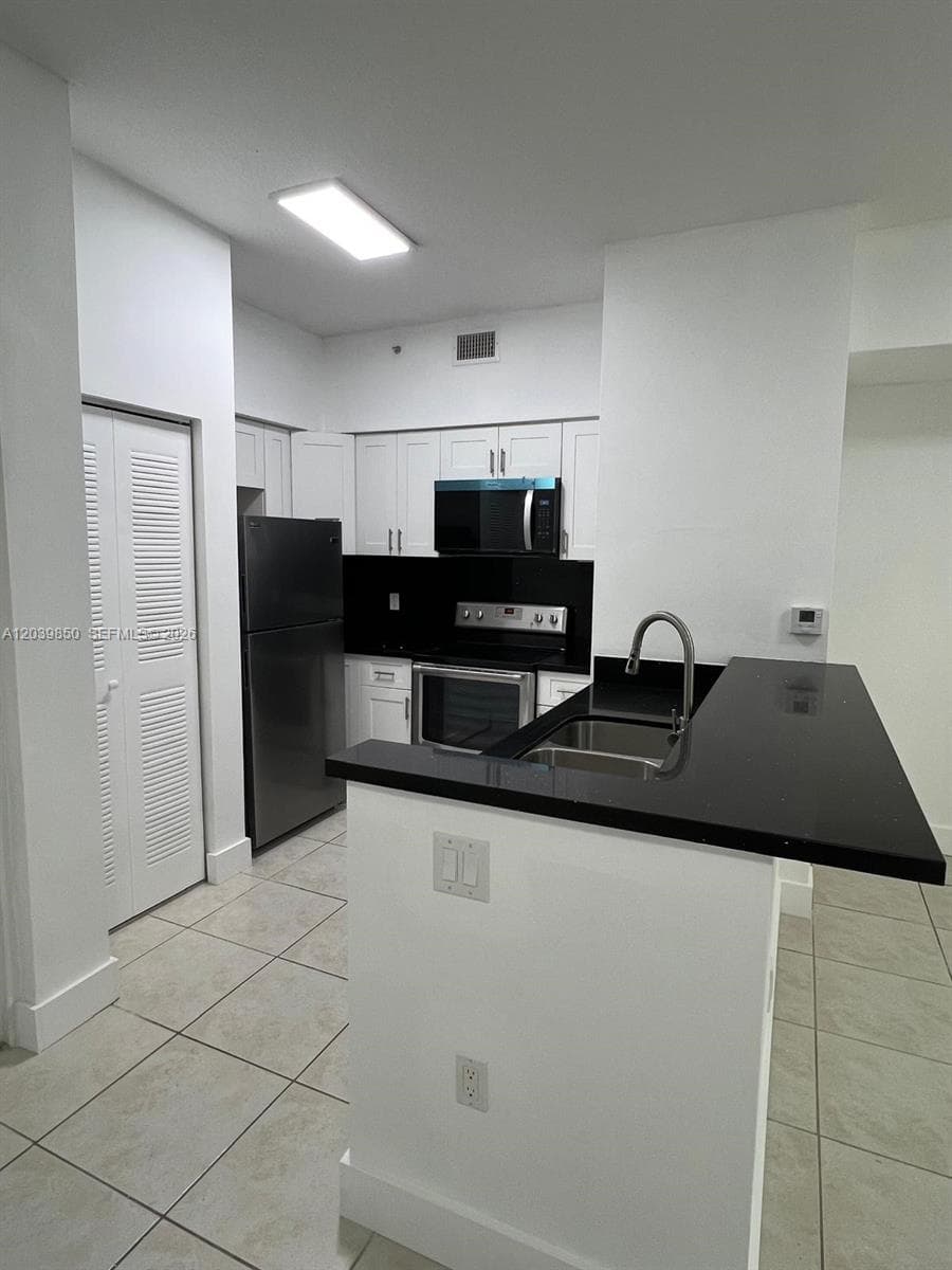 PALM GARDENS AT DORAL CON · #103 in Doral - Photo 6