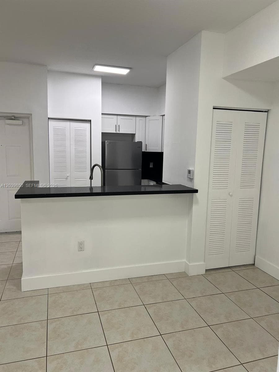 PALM GARDENS AT DORAL CON · #103 in Doral - Photo 3