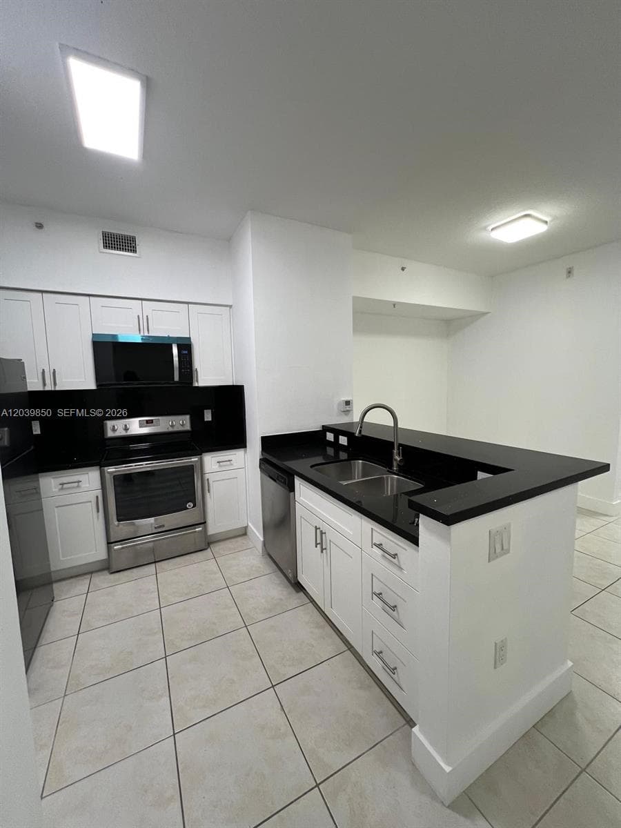 PALM GARDENS AT DORAL CON · #103 in Doral - Photo 5
