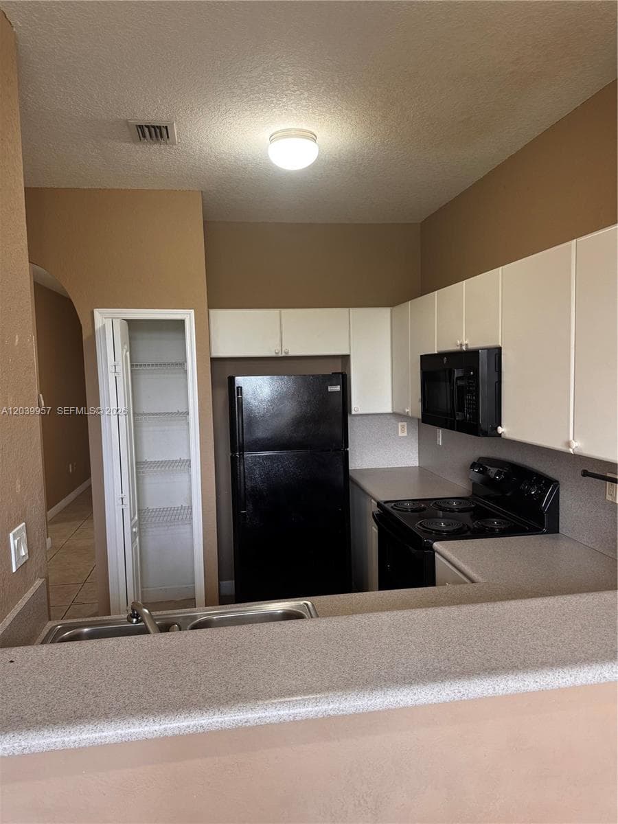 SHOMA HOMES AT COUNTRY CL · #203-10 in Hialeah - Photo 13