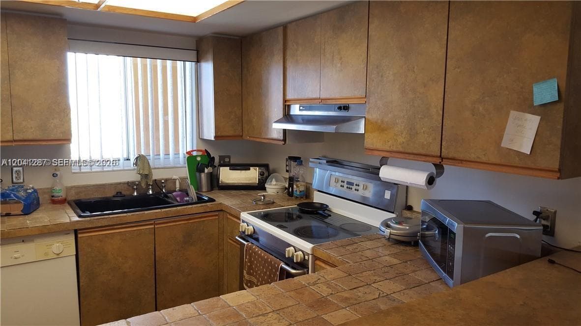POINCIANA VILLAGE CONDO · #408 in Miami - Photo 3