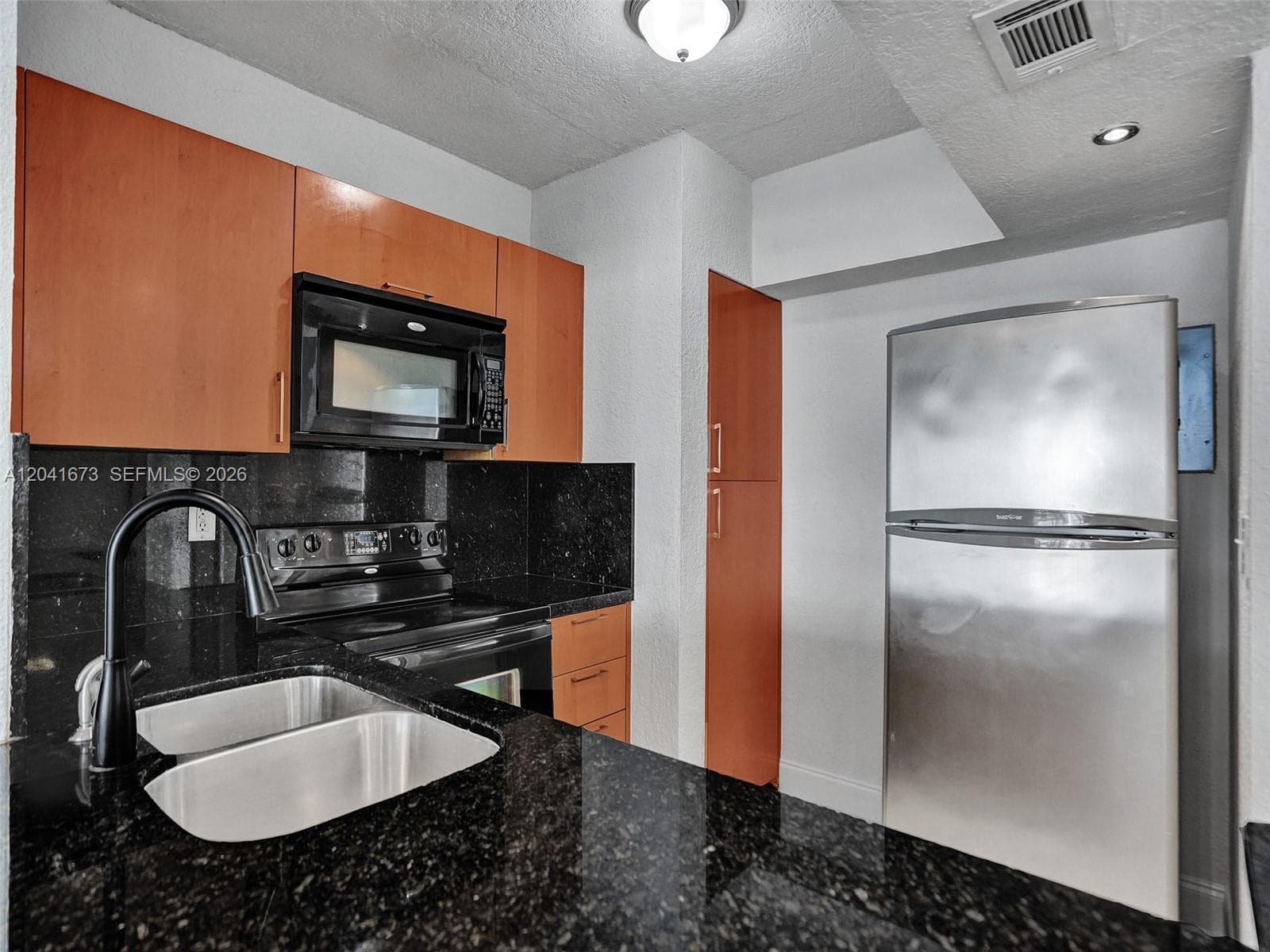 LUDLUM LAKE CONDO BLDG C · #C112 in Hialeah - Photo 16