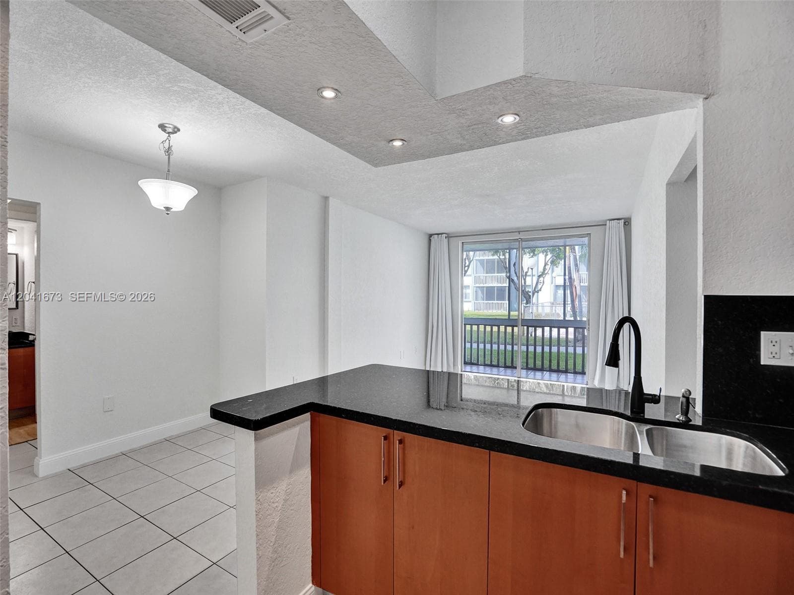 LUDLUM LAKE CONDO BLDG C · #C112 in Hialeah - Photo 9