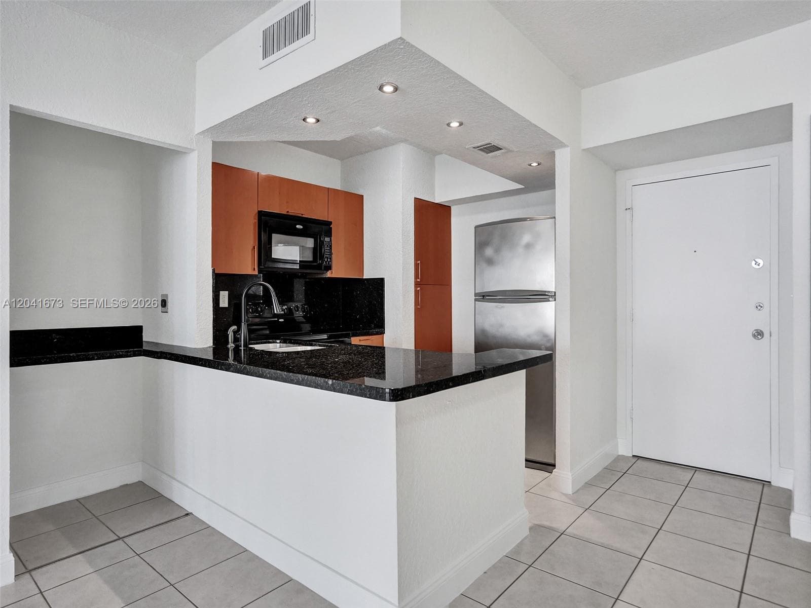 LUDLUM LAKE CONDO BLDG C · #C112 in Hialeah - Photo 10
