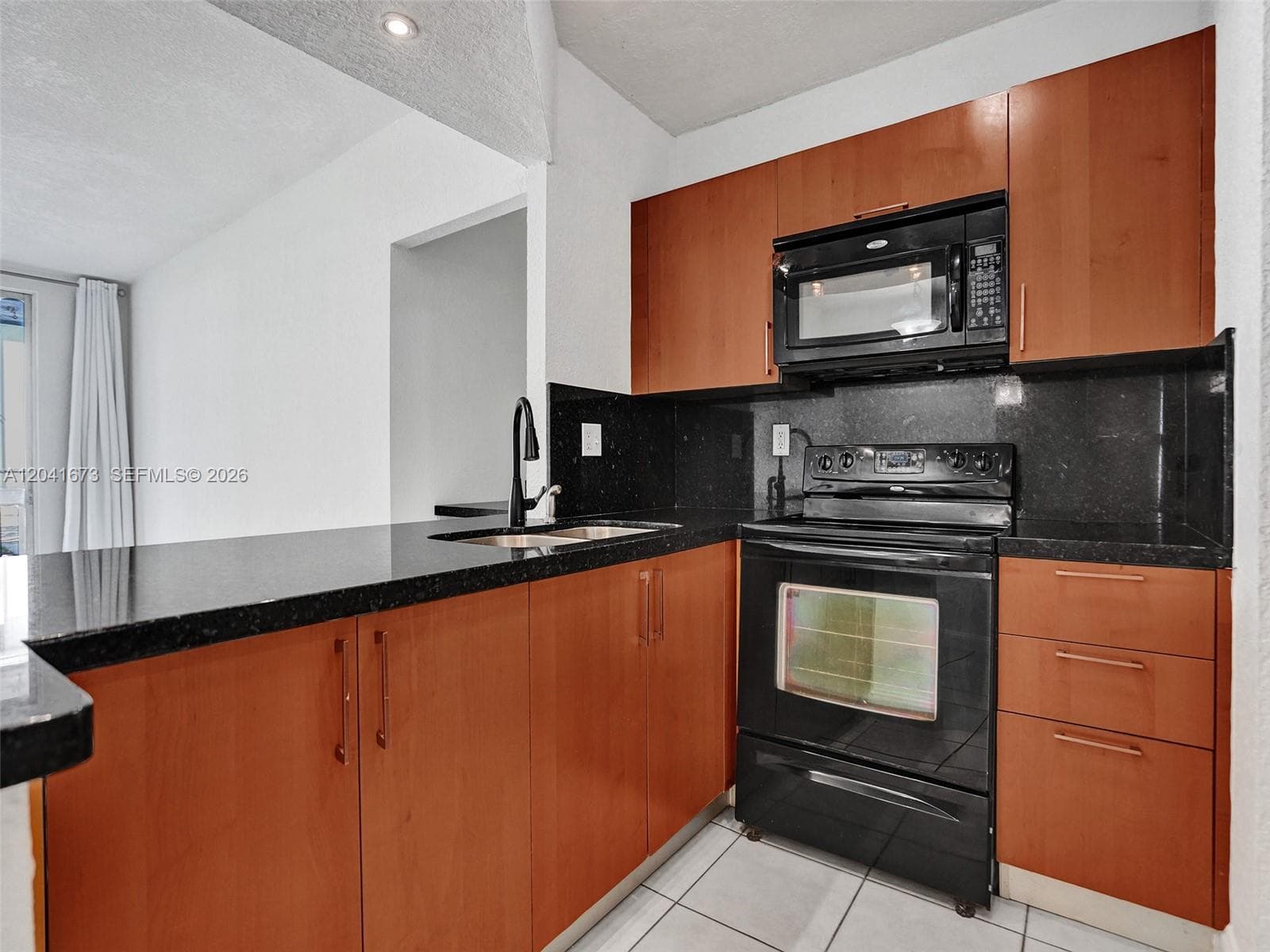 LUDLUM LAKE CONDO BLDG C · #C112 in Hialeah - Photo 8
