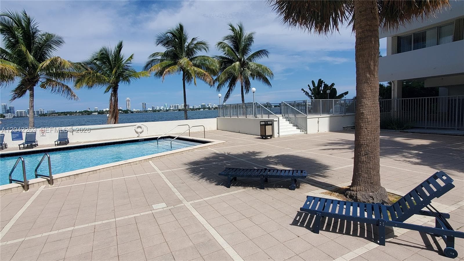 Pool, Bay and Sun Deck with Coconut Trees!