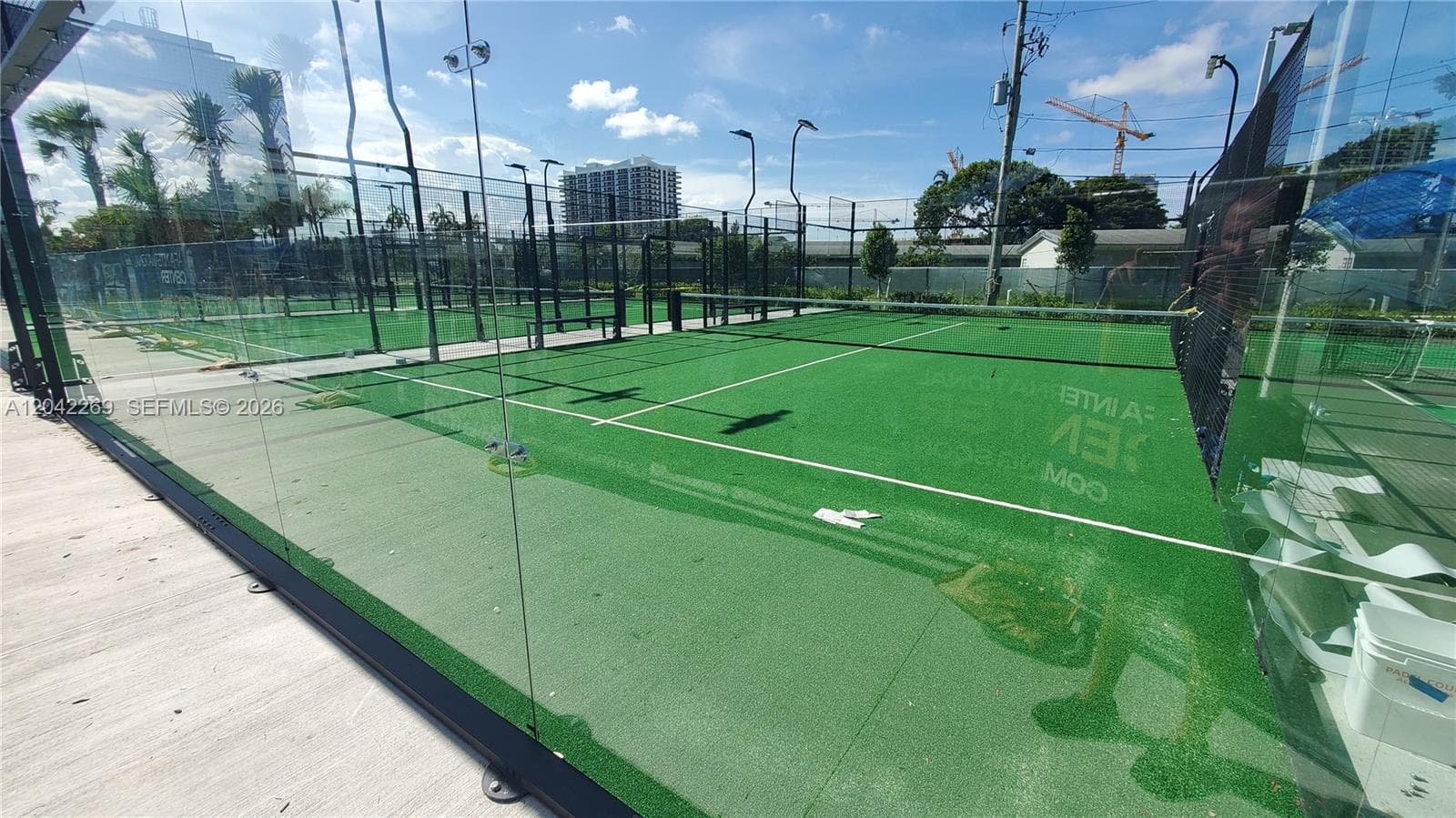 4 Paddle Courts & Pickleball across the street with Glass Enclosure