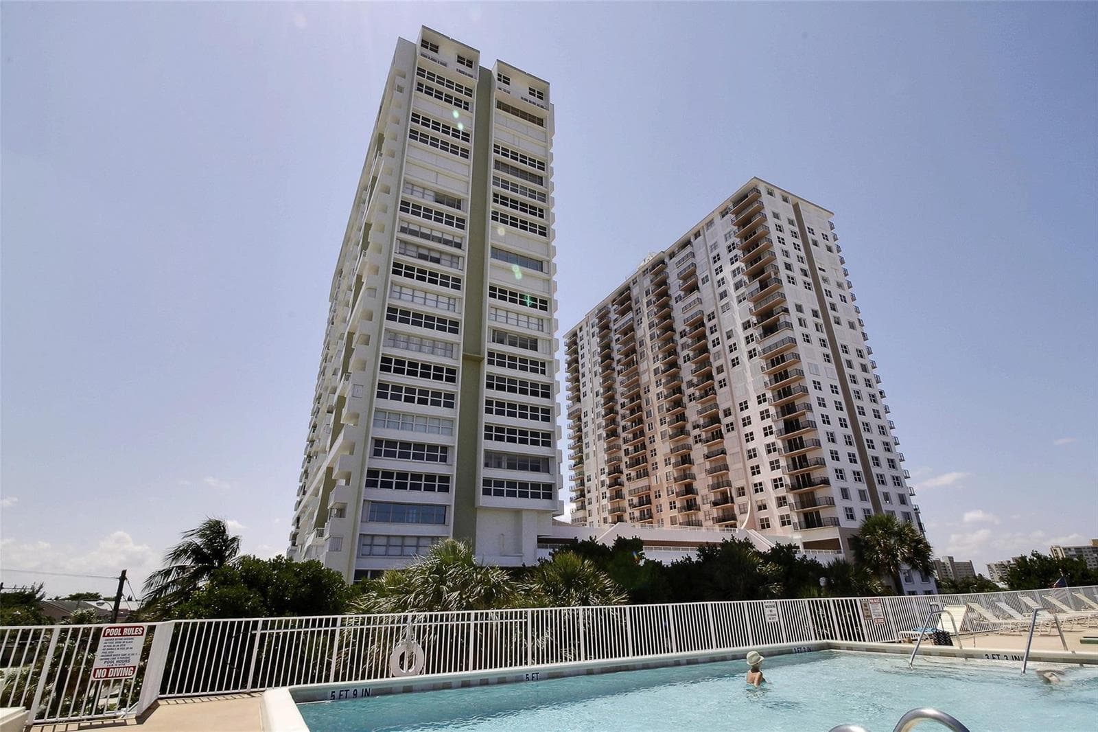 Building exterior and south pool