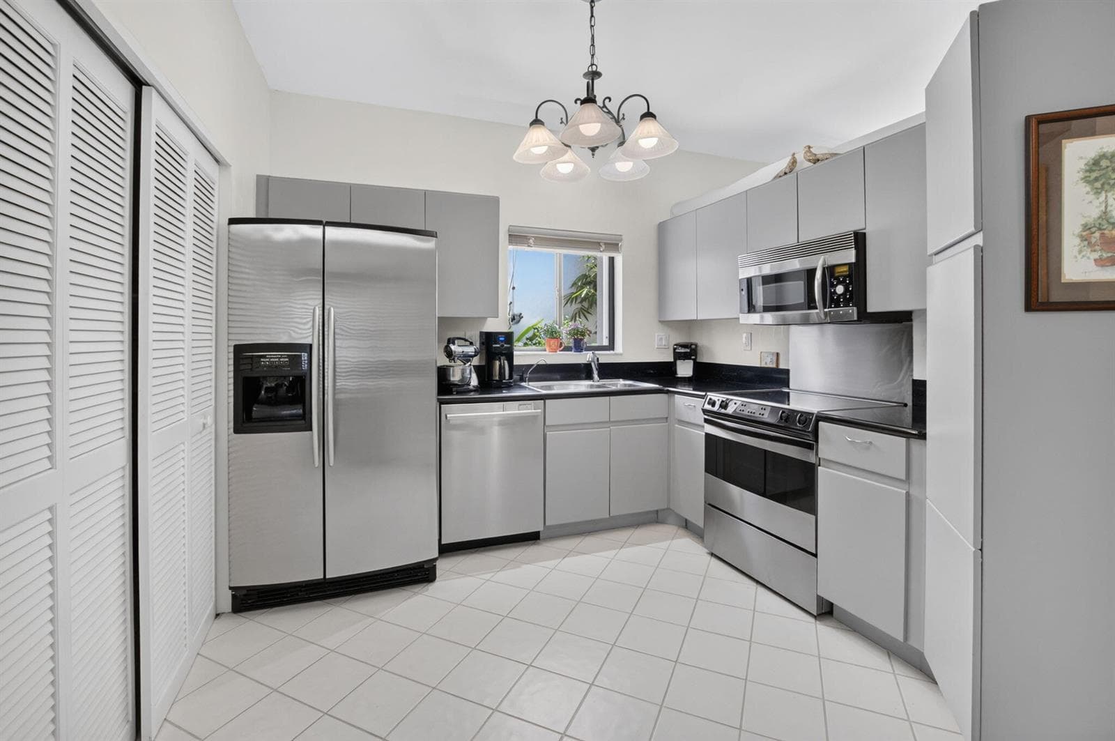 UPDATED KITCHEN WITH CORIAN COUNTERTOPS