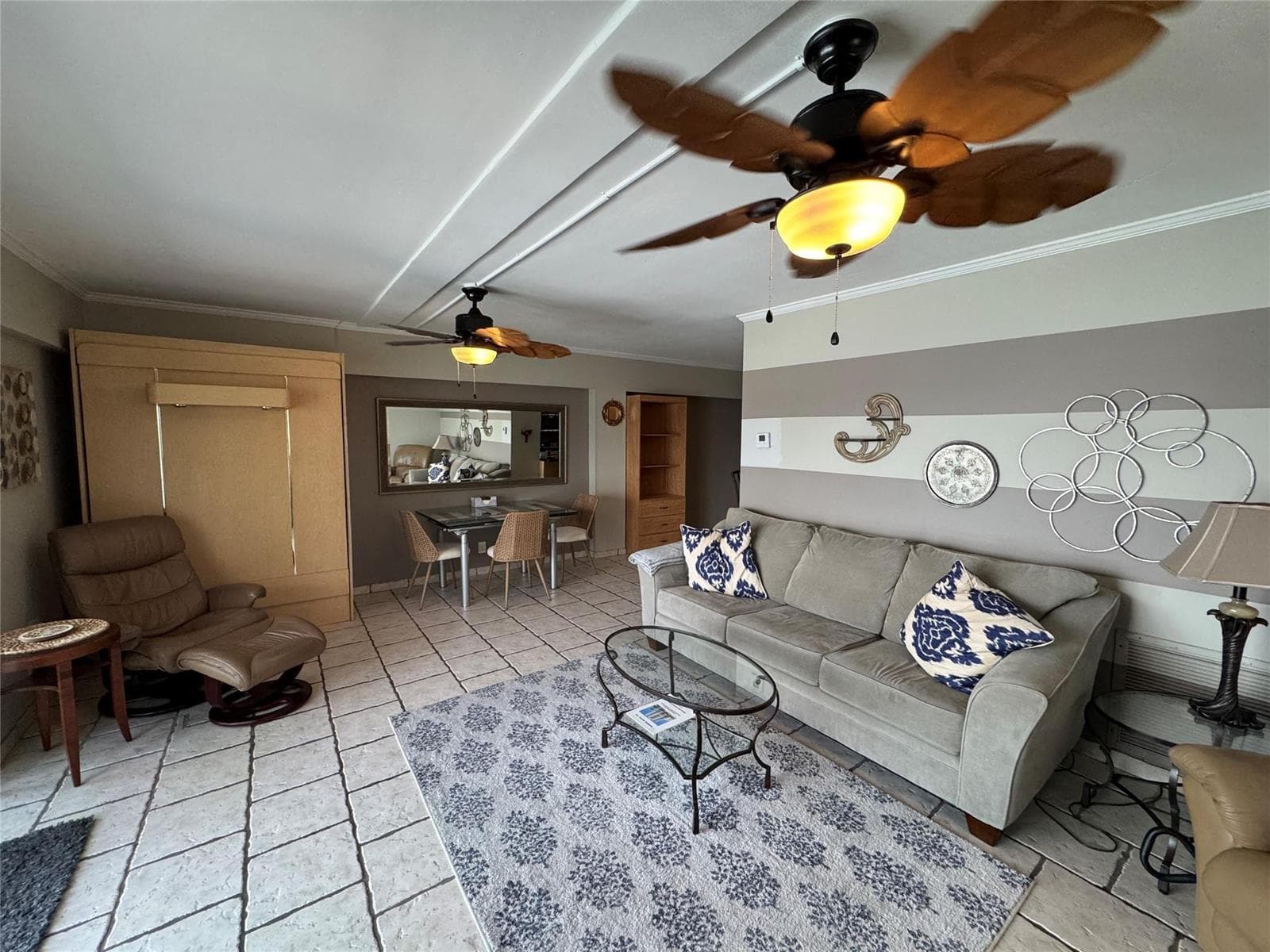 Murphy bed on wall left side of photo
