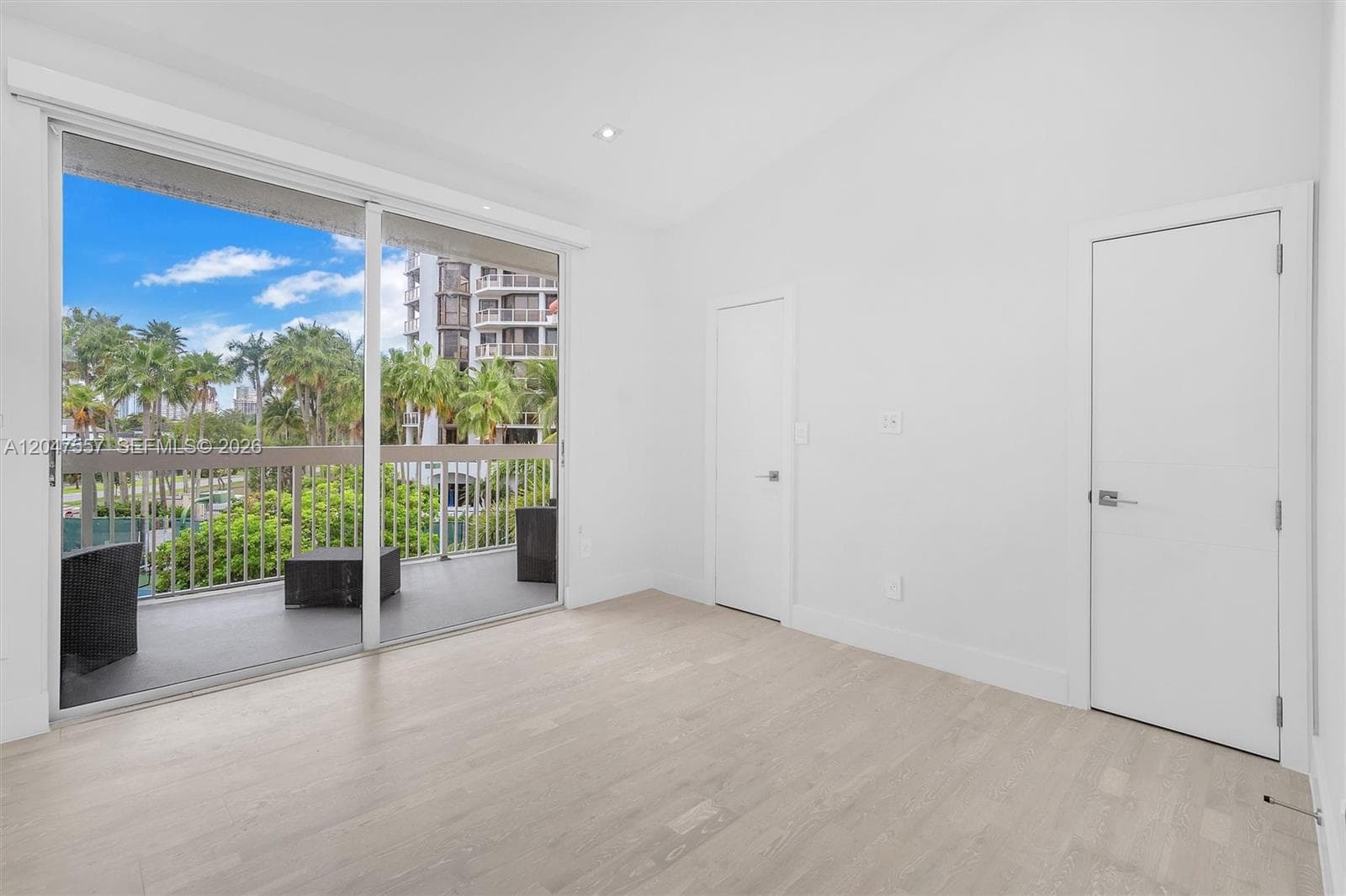Third bedroom with oversized balcony and view to canal