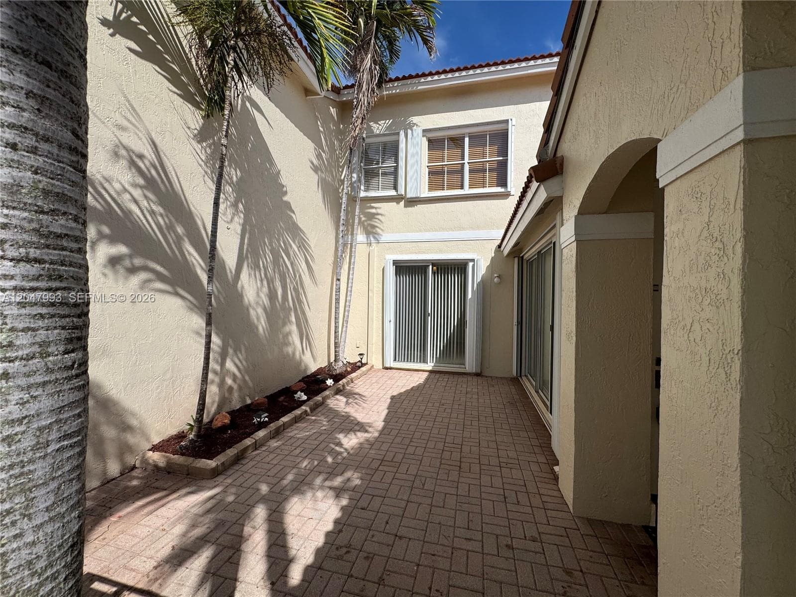 Entry through Private Courtyard