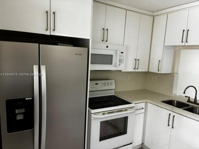 VILLAGE OF KINGS CREEK CO · #K310 in Miami - Photo 3