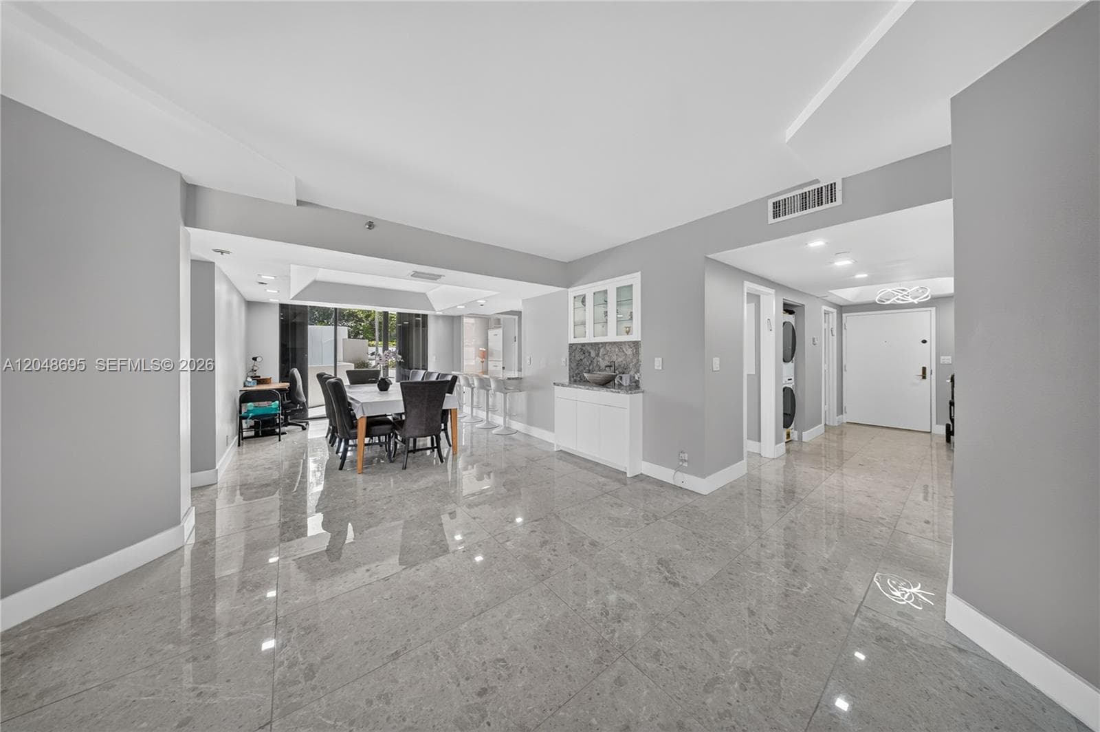 SPACE FROM DINING TO LIVING AND FOYER