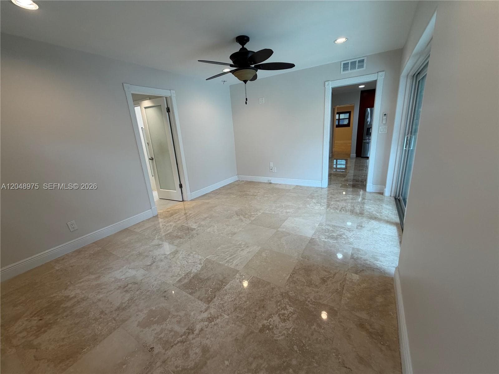 Primary Bedroom Walk-In Closet (between Primary Bathroom and Office)