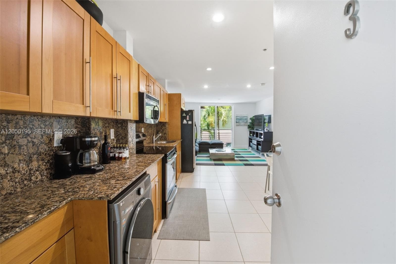 Kitchen including washer & dryer